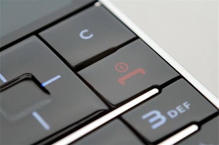 simsearch:400-03992117,k - A close up shot of mobile keypad under light Stock Photo - Budget Royalty-Free & Subscription, Code: 400-04450600