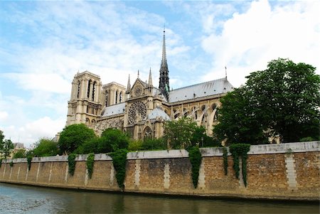 simsearch:400-04955587,k - Cathedral of Notre Dame de Paris - side view with rose window. Paris, France. Fotografie stock - Microstock e Abbonamento, Codice: 400-04450755