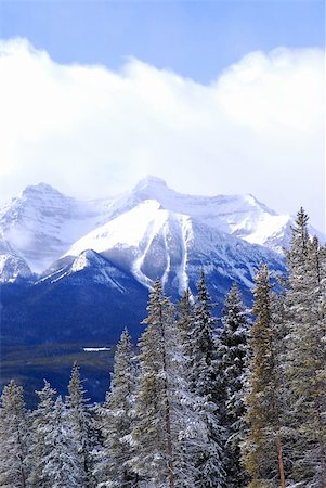simsearch:400-05904919,k - Snowy mountain ridges at Lake Louise in Canadian Rocky mountains Stock Photo - Budget Royalty-Free & Subscription, Code: 400-04450751