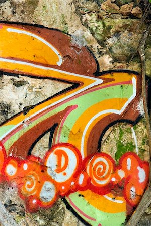 spritzlack - Concrete wall covered with graffiti. Stockbilder - Microstock & Abonnement, Bildnummer: 400-04450832