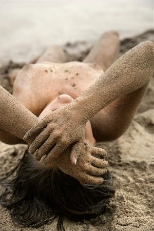 simsearch:400-04450908,k - Sexy Caucasian young adult nude woman lying on beach. Stock Photo - Budget Royalty-Free & Subscription, Code: 400-04450906
