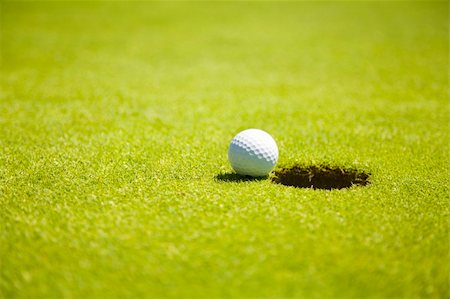 passtime - Golf club: ball close to the 18th hole Stock Photo - Budget Royalty-Free & Subscription, Code: 400-04451229