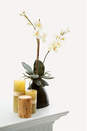 simsearch:400-04956215,k - Still life of yellow candles and white orchids. Photographie de stock - Aubaine LD & Abonnement, Code: 400-04451357