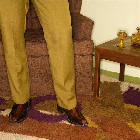 simsearch:400-04451365,k - Close-up of standing Caucasian mid-adult male legs in vintage clothing. Foto de stock - Super Valor sin royalties y Suscripción, Código: 400-04451391