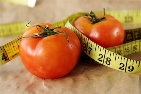 physical fit food - Tomato with measuring tape Stock Photo - Budget Royalty-Free & Subscription, Code: 400-04451461