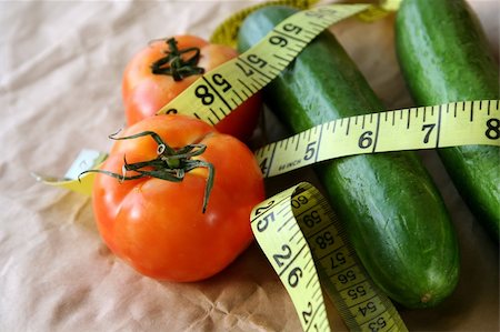 physical fit food - Tomato & cucumber with measuring tape Stock Photo - Budget Royalty-Free & Subscription, Code: 400-04451462