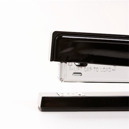 simsearch:400-03926032,k - Close up of black stapler on white background. Stock Photo - Budget Royalty-Free & Subscription, Code: 400-04451862