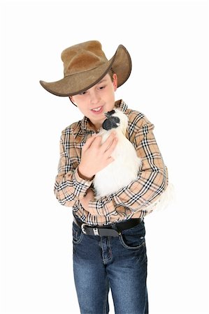 silkie - Child holding a small silkie bantam.  Silkies are the only bantam to have black skin. Stock Photo - Budget Royalty-Free & Subscription, Code: 400-04452133