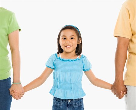 filipina mother daughter - Asian girl holding hands with mother and father in front of white background. Photographie de stock - Aubaine LD & Abonnement, Code: 400-04452255