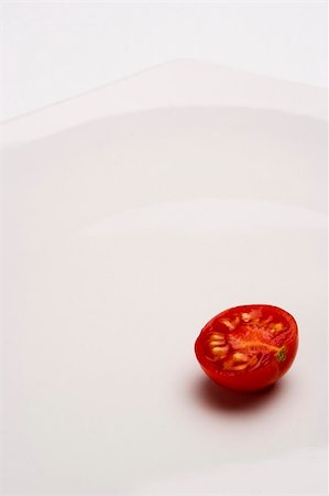 restaurant washing dishes - Tomatos in white plate close up Stock Photo - Budget Royalty-Free & Subscription, Code: 400-04452555