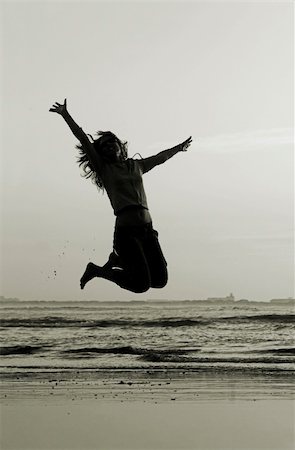 simsearch:400-04215852,k - Woman doing exercise on the beach Stock Photo - Budget Royalty-Free & Subscription, Code: 400-04453163