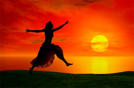 Silhouette of a woman jumping at the sunset Stock Photo - Budget Royalty-Free & Subscription, Code: 400-04453174