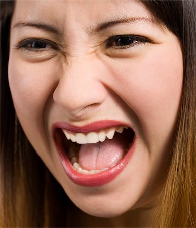 skin problem - Face of a screaming pretty woman. Close up. Stock Photo - Budget Royalty-Free & Subscription, Code: 400-04453382