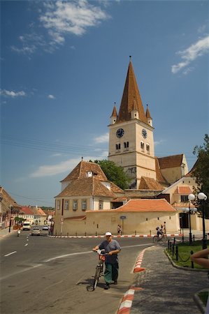 Mediaeval Street in Cisnadie with view towards the Fortified Church, Transylvania, Romania. Stock Photo - Budget Royalty-Free & Subscription, Code: 400-04453409