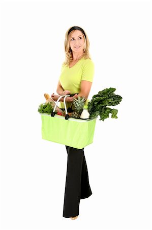 pineapple consumer - Eco shopper with basket of groceries looking sideways, space for copy Stock Photo - Budget Royalty-Free & Subscription, Code: 400-04453684