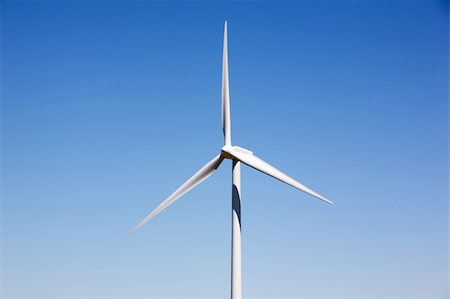 simsearch:400-04465410,k - A detail of a wind turbine against a deep blue sky Stock Photo - Budget Royalty-Free & Subscription, Code: 400-04464247