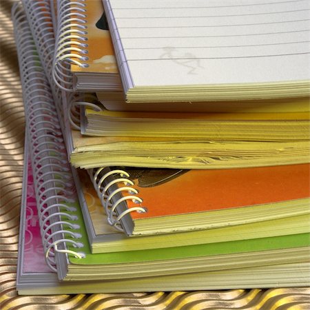 simsearch:400-03990507,k - A pile of notebooks Stock Photo - Budget Royalty-Free & Subscription, Code: 400-04464315