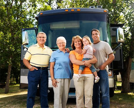 simsearch:400-05314669,k - Portrait of three generation Caucasian family standing in front of recreational vehicle smiling and looking at viewer. Photographie de stock - Aubaine LD & Abonnement, Code: 400-04465344