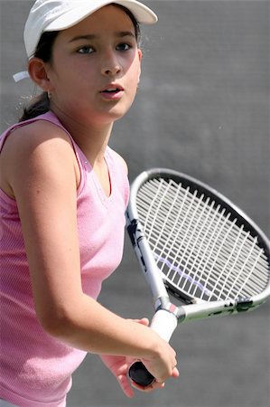 simsearch:400-04067347,k - Teenage girl playing tennis Foto de stock - Super Valor sin royalties y Suscripción, Código: 400-04465834