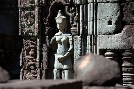 simsearch:400-04466118,k - Statue carving on mandapa, Siem Reap, Cambodia Fotografie stock - Microstock e Abbonamento, Codice: 400-04466118