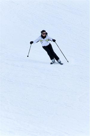 skiing woman taking a ride Stock Photo - Budget Royalty-Free & Subscription, Code: 400-04466245