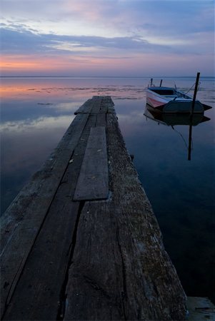 fishing dawn tranquil - Boat at Nero lake at twilight Stock Photo - Budget Royalty-Free & Subscription, Code: 400-04467028