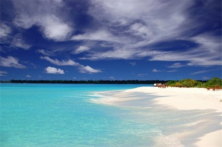 simsearch:400-03928487,k - tropical coastline with white sandy beach and beautiful turquoise ocean Foto de stock - Royalty-Free Super Valor e Assinatura, Número: 400-04467095