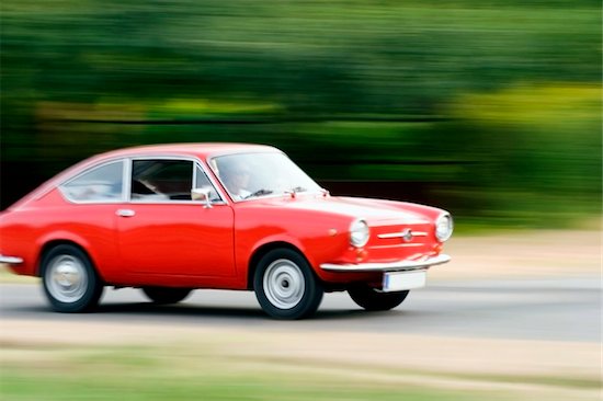 Red Car  moving fast Stock Photo - Royalty-Free, Artist: Fesus, Image code: 400-04467332