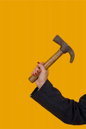 prison break - a businesswoman holding a hammer with anger Stock Photo - Budget Royalty-Free & Subscription, Code: 400-04467543