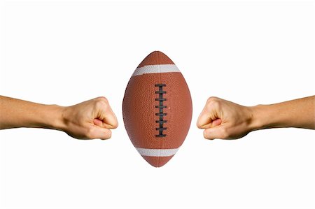 Two hands trying to smashing a football Stock Photo - Budget Royalty-Free & Subscription, Code: 400-04467645