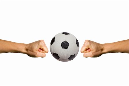 Two hands trying to smashing a soccer ball Stock Photo - Budget Royalty-Free & Subscription, Code: 400-04467646