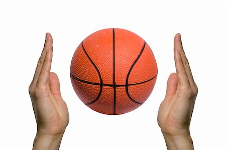 two hands holding a basketball Stock Photo - Budget Royalty-Free & Subscription, Code: 400-04467654