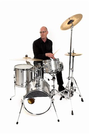 simsearch:400-06133570,k - shot of drummer playing over white backdrop Stock Photo - Budget Royalty-Free & Subscription, Code: 400-04467706