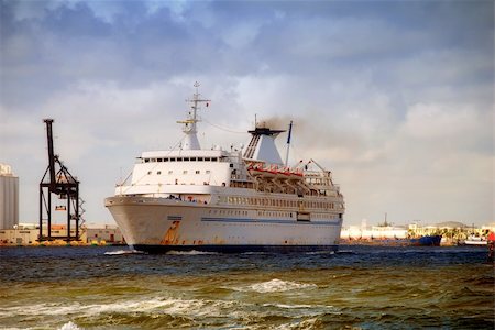 Passenger ship leaving industrial port Stock Photo - Budget Royalty-Free & Subscription, Code: 400-04468165