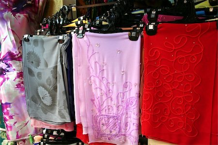 Traditional asian fabrics and clothes for sale in a shop in Malaysia Stock Photo - Budget Royalty-Free & Subscription, Code: 400-04468489