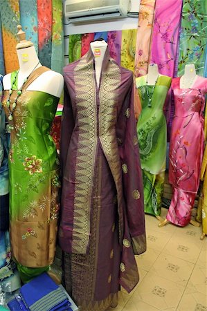 Traditional asian fabrics and clothes for sale in a shop in Malaysia Stock Photo - Budget Royalty-Free & Subscription, Code: 400-04468491