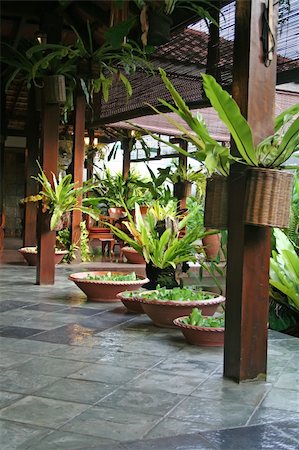 Wooden table and chairs in tropical balinese style Stock Photo - Budget Royalty-Free & Subscription, Code: 400-04468520