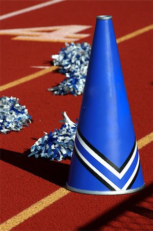simsearch:400-04312909,k - Cheerleader pom poms and megaphone at a football game Stock Photo - Budget Royalty-Free & Subscription, Code: 400-04468704
