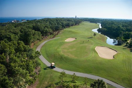 simsearch:400-03940596,k - Aerial view of golf course in coastal residential community at Bald Head Island, North Carolina. Foto de stock - Super Valor sin royalties y Suscripción, Código: 400-04468748