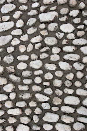 Cobblestones set into cement on an old path. Stock Photo - Budget Royalty-Free & Subscription, Code: 400-04468755