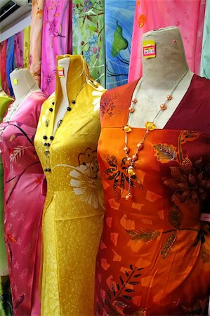 Traditional asian fabrics and clothes for sale in a shop in Malaysia Stock Photo - Budget Royalty-Free & Subscription, Code: 400-04468993