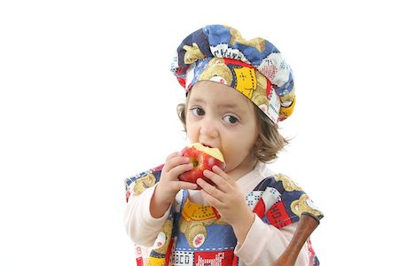 Cute toddler eating an apple dressed as a chef. More pictures of this baby at my gallery Stock Photo - Budget Royalty-Free & Subscription, Code: 400-04469073