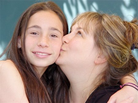 simsearch:400-04747810,k - mother kissing her daughter Stock Photo - Budget Royalty-Free & Subscription, Code: 400-04469205