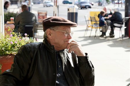 Senior man enjoying a sunny day in the city Stock Photo - Budget Royalty-Free & Subscription, Code: 400-04469264