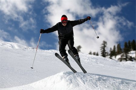 simsearch:400-03938721,k - Skier on a slope against the cloudy sky Photographie de stock - Aubaine LD & Abonnement, Code: 400-04469328