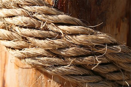 simsearch:400-08013576,k - Rope on a wooden surface / macro Stockbilder - Microstock & Abonnement, Bildnummer: 400-04469558