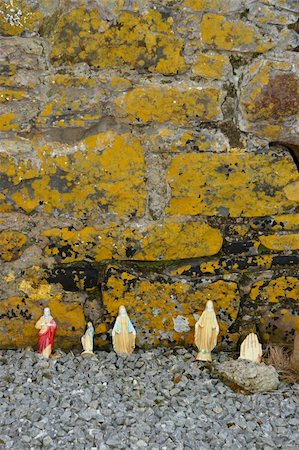 religious stauettes against a wall Stock Photo - Budget Royalty-Free & Subscription, Code: 400-04469851