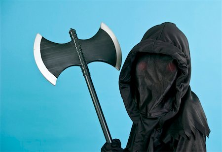 A child in a spooky black costume holding a midieval axe. Stock Photo - Budget Royalty-Free & Subscription, Code: 400-04461395