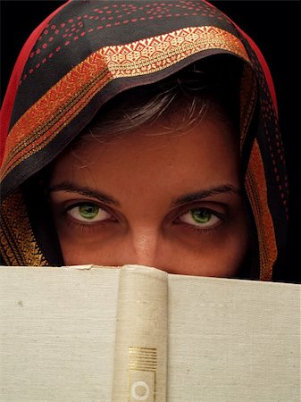 green eyed woman with book Stock Photo - Budget Royalty-Free & Subscription, Code: 400-04461397