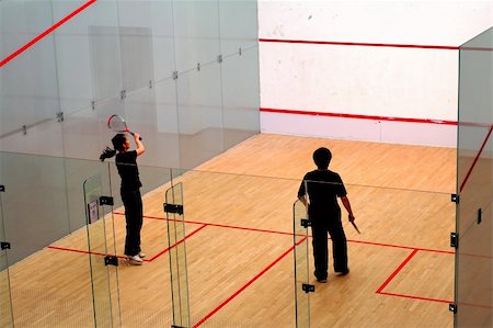A couple of young boy and girl playing squash Stock Photo - Budget Royalty-Free & Subscription, Code: 400-04461427
